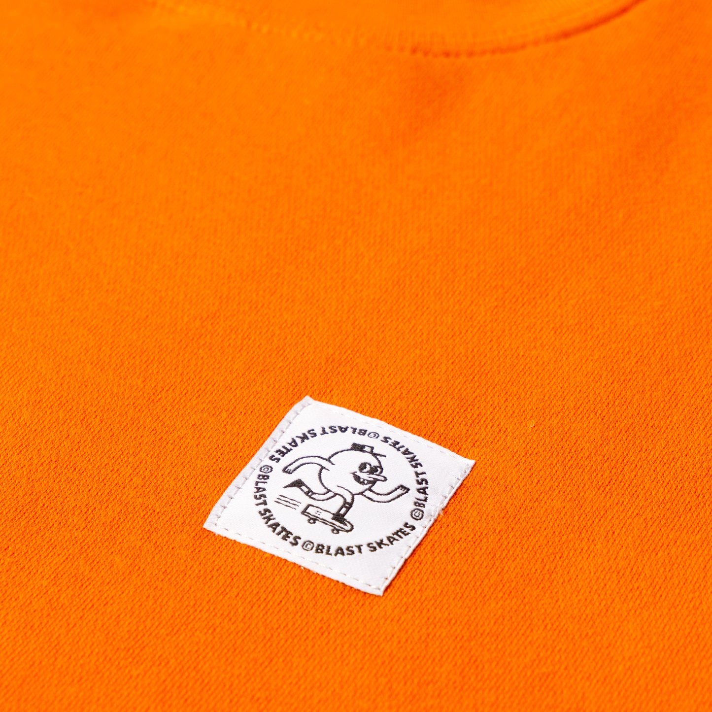 ORANGE ROUND LOGO CREW NECK